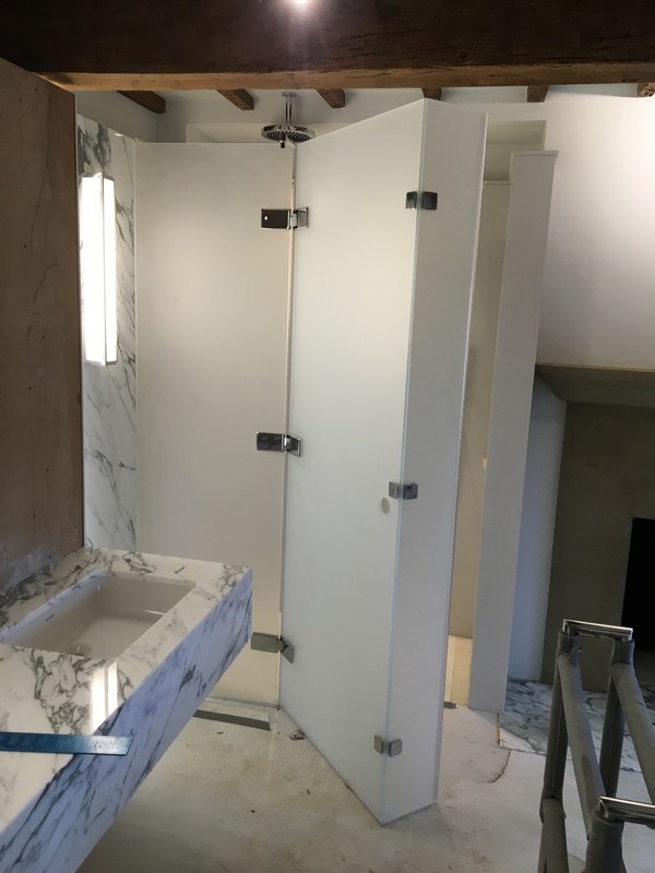 Bespoke frosted glass shower enclosure in Merton luxury bathroom